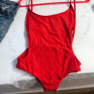 Red swimming body suit
